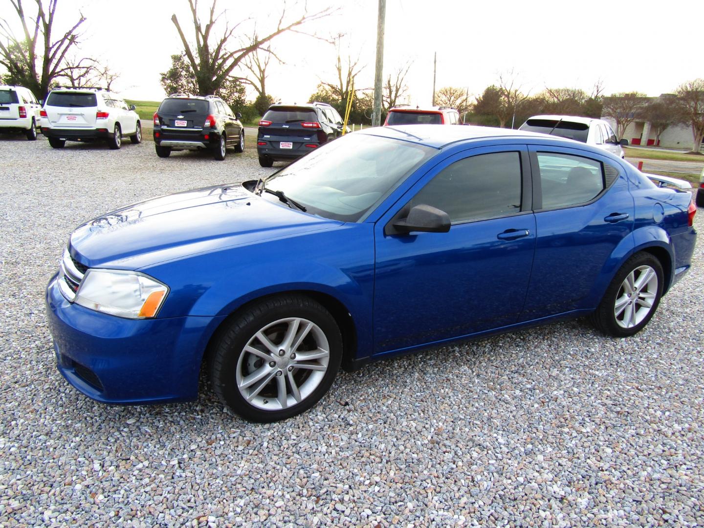 2012 Blue Dodge Avenger SE (1C3CDZAG6CN) with an 3.6L V6 DOHC 24V FFV engine, Automatic transmission, located at 15016 S Hwy 231, Midland City, AL, 36350, (334) 983-3001, 31.306210, -85.495277 - Photo#2